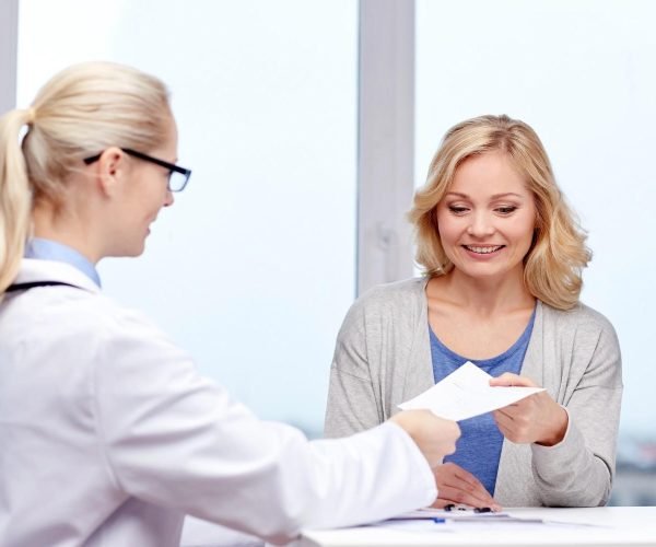 doctor giving medical prescription doctor giving medical prescription
