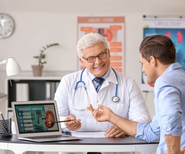 urologist with patient urologist with patient